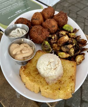 Hush puppies, fried Brussels, and corn bread with bourbon butter    at South x Northwest in Portland