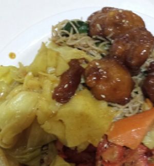 A few options on this plate-all vegan honey chicken, curry, noodles and roast duck.  at Divine Realm Vegie Delight in Point Cook