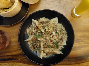 Creamy dumplings in delicious white wine sauce at Element Vegetarian in Phnom Penh