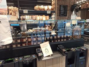 
the cashier at Land & Monkeys - Pernety in Paris