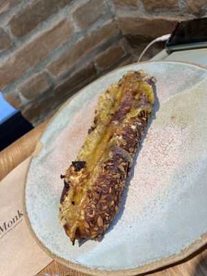 warm hotdog 🌭(highly recommend)  at Land & Monkeys - Pernety in Paris