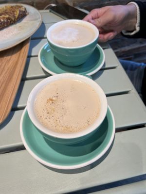 coffee latte with oat milk ☕️   at Land & Monkeys - Pernety in Paris