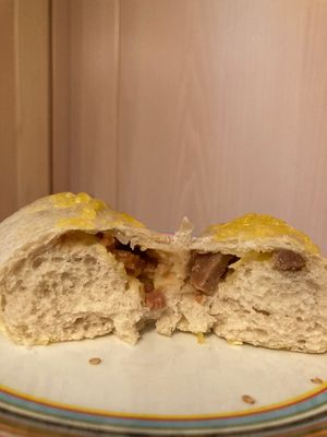 Pains aux lardons close up at Land & Monkeys - Pernety in Paris