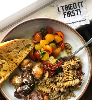 Pesto pasta, citrus marinated tomatoes, smashed potatoes, garlic bread 😘 at PiANTA in Providence