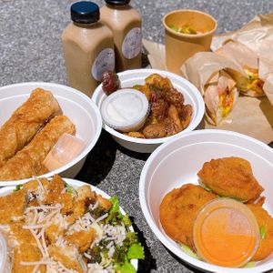 Coffee milk, steak & cheese egg rolls, Caesar salad, corn fritters, potato salad, smashed potatoes, Italian sub 😍 at PiANTA in Providence