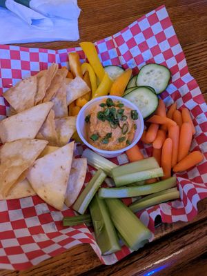 House-made hummus, warm and soft pita, and veggies. Super yummy! at Off Broadway Taproom in Madison