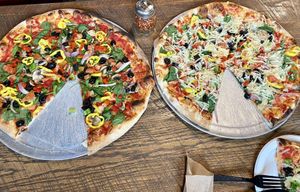 One plain veggie and one veggie covered in violife cheese. Made to order for my husband and I.  Crust is perfection!!  at dO wood fired in Irwin