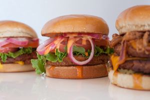 Variety of plant-based sandwiches and wraps at Earth Burger - Stone Ridge Market in San Antonio