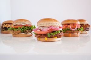 Variety of plant-based sandwiches and wraps at Earth Burger - Stone Ridge Market in San Antonio