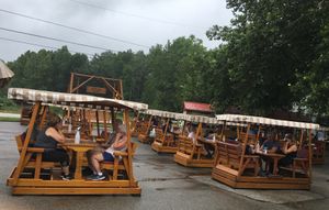 Outdoor seating in glider-style tables at Szalay's Sweet Corn Farm in Peninsula