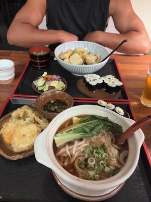 Agedashi tofu for him, Noodles soup (can't remember the name of the dish) for me.. It's absolutely delicious!!! at Sushi Chungjeon 초밥충전 in Jeju