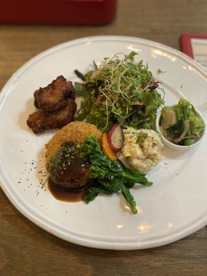 Potato croquette with Karaage, salad, and pickled veggies   at Rainbow Bird Rendezvous in Tokyo