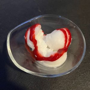 A heart of lemon gelato with red sauce is a perfect end to this delicious meal. at El Drac al Cau del Llop in Girona