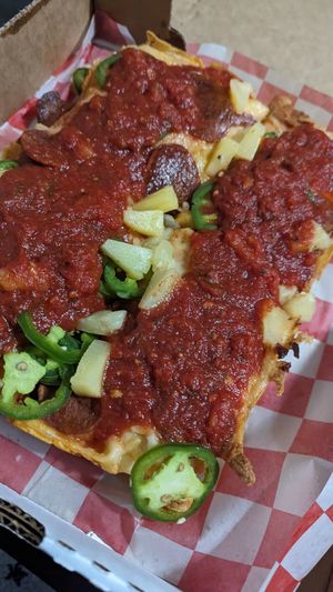 Pinepeno with vegan pepperoni and numu cheese at Pizza Wizard in Rochester