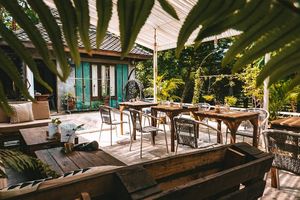 Outdoor seating area  at Milk & Honey in Koh Tao
