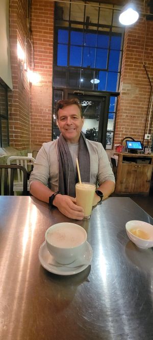 Enjoying my mango smoothie at Living Kitchen - South End in Charlotte