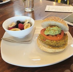 Fire & Brimstone Burger w/ Fruit Salad at Living Kitchen - South End in Charlotte