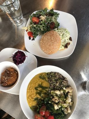 Yellow curry, sweet potato mash, oyster sandwich, Caesar salad with kale at Living Kitchen - South End in Charlotte