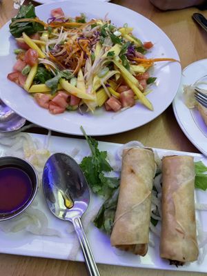 Already digging in to our mango salad and crispy rolls   at Purple Thai in New York City