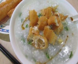 Vegetarian Combination Congee (Rice Porridge) $7.50 with optional yu-tiaw (Chinese donuts) $1.90ea on top. at Mother Chu's Taiwanese Cuisine in Haymarket
