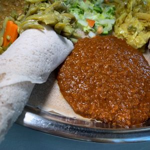 Yemesir Wat: Red Lentils simmered in a spicy Berbere Sauce (Part of the Vegetarian Combos, which are also Vegan) at Gojo Ethiopian Cuisine in Grand Rapids