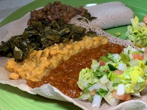 From their Vegan Buffet (Wed/Thurs):  Azifa (Brown Lentils), Chopped Collard Greens, Kik Aicha (Split Chick Peas), Red Lentils w/ Berbere Sauce,  Salad, Injera at Gojo Ethiopian Cuisine in Grand Rapids