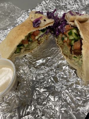 Falafel pita with red cabbage, hummus, veggies   at Naf Naf Grill in Indianapolis