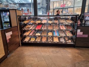 counter with donuts  at Dunkin' in Eindhoven