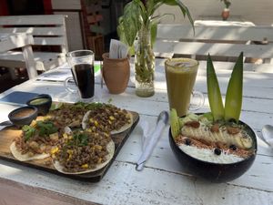 Hulk spirulina bowl, soy chorizo and asada tacos, golden milk and coffee  at Elixir Spot in Puerto Vallarta
