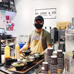 Friendly staff at Ah Lock & Co in Central Singapore