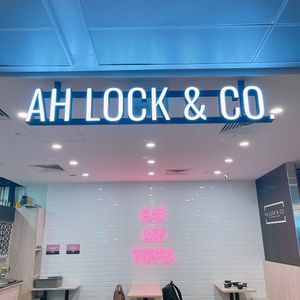 Signage at Ah Lock & Co in Central Singapore