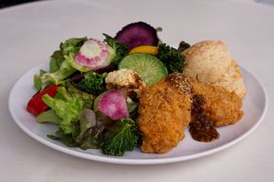 0% Chick'n Fillet Plate
Crispy chick'n fillet tenders with maple mustard sauce on top. Comes with a salad with seasonal vegetables and your choice of rice or an American Biscuit. at Whitely by Toriba Coffee in Hayama