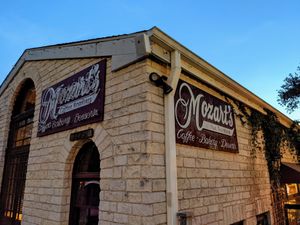 Not much adjacent parking but plenty of spaces across the street. at Mozart's Coffee Roasters in Austin