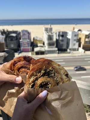 Cinnamon roll and olive jalapeño croissant  at Chaumont Vegan in Beverly Hills