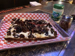 Vegan pizza w sausage and olives   at Guerrilla Pizza  in Las Vegas