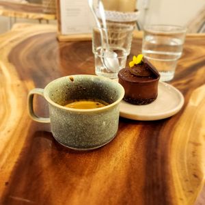 Triple chocolate mini cake and double espresso at Rawberry in Ho Chi Minh City