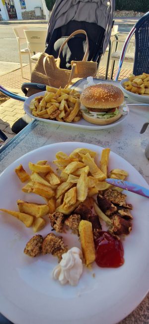 Vegan burger & vegan children's sausage meal at Gigi's Chippy Diner in Menorca