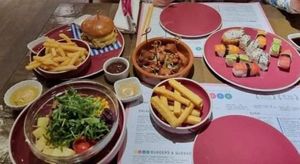 Petite Sushi and beyond meat patty cheeseburger! at 123V Browns in London