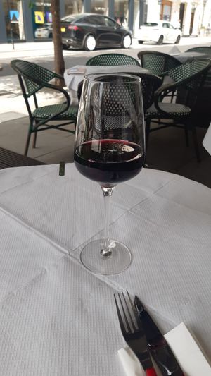 Glass of pricey wine at 123V Browns in London