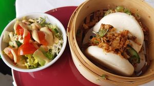"duck" bao buns (2) with side salad at 123V Browns in London