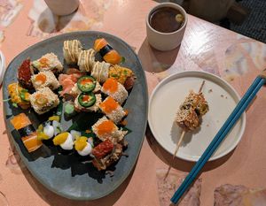 Chef's choice platter, miso soup, and a tofu skewer at 123V Browns in London