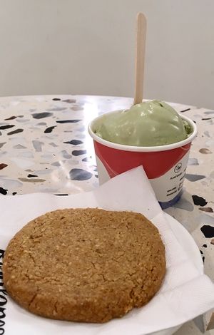 Pandan gula melaka ice cream and an almond oatmeal cookie at Kind Kones - Paragon Orchard in Central Singapore