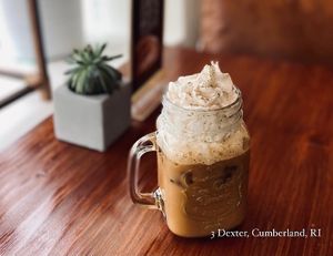 Cardamom  Vanilla Iced Latte
+ Coconut Whip Cream at Apothica Cafe in Cumberland