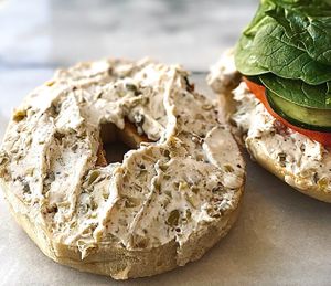 Garden Delight 
- Garlic Herb Cream cheese
+ Spinach, Tomato, cucumbers, red onion. at Apothica Cafe in Cumberland