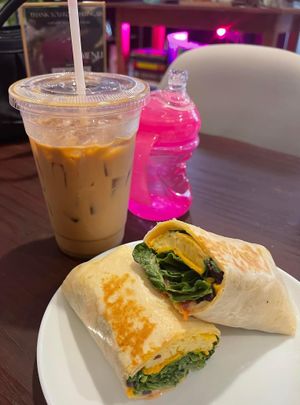 Coffee and gf wrap at Apothica Cafe in Cumberland