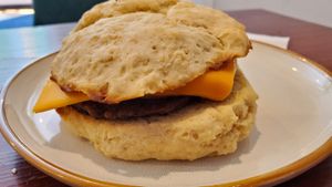 sausage egg and cheese on a biscuit at Apothica Cafe in Cumberland
