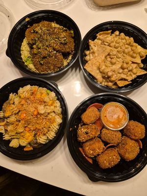 Apothica at night food!!!! Mediterranean Harvest, BBQ chickpea nachos, Fried tofu bites, and pot pie 🥧 pasta. 😋 at Apothica Cafe in Cumberland