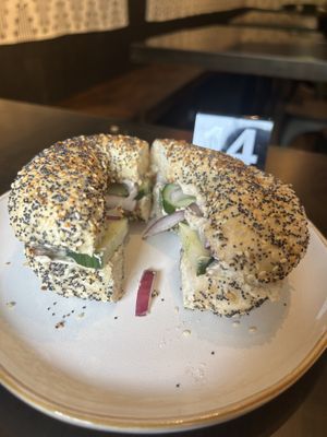 Everything bagel with garlic herb cream cheese, cucumber, onion at Apothica Cafe in Cumberland