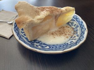 Apple cake with vegan vanilla sauce  at La Bohême in Cordoba