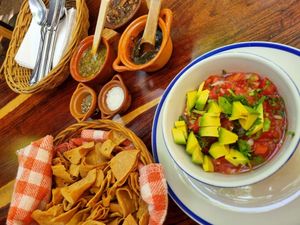 Sauces to spice things up in the back  at La Cueva del Chango in Playa Del Carmen